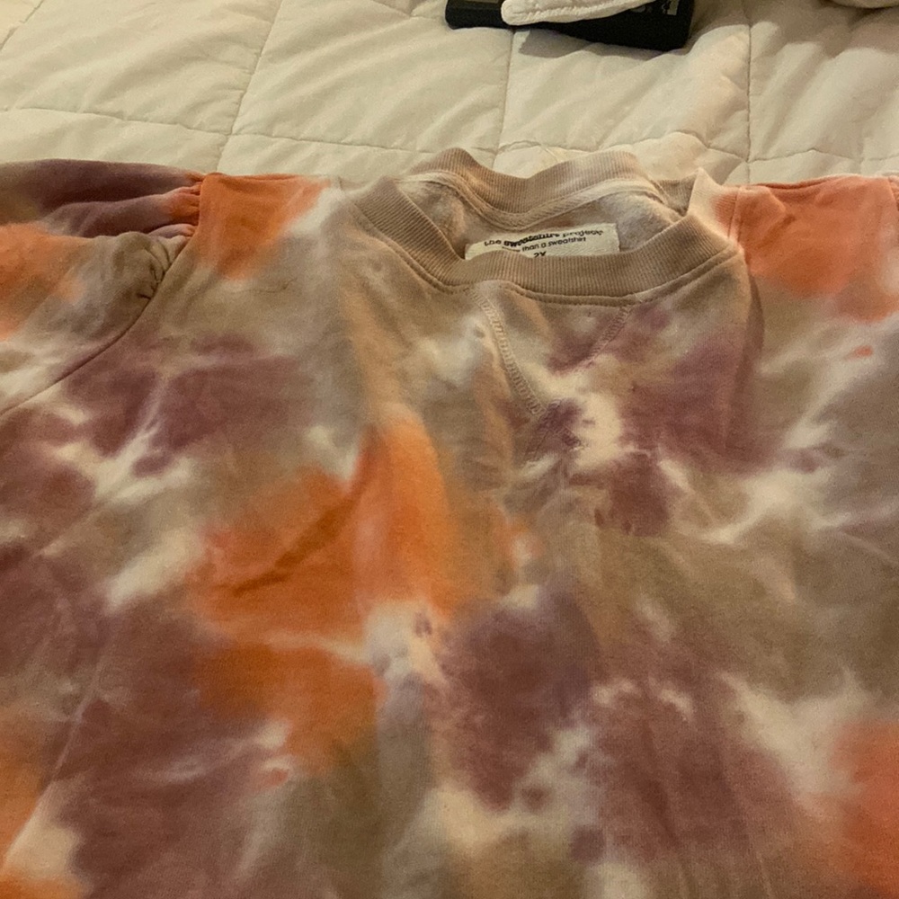 Never worn new with tags brand is the sweatshirt project
